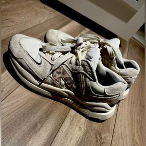 Gently worn New Balance 5740 leopard sneakers, size 9.